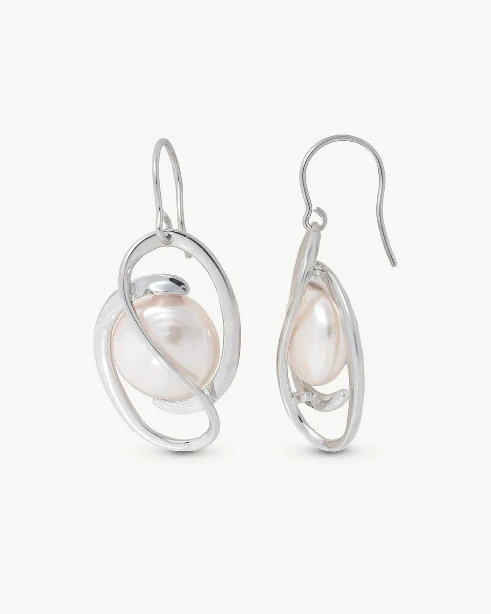 Front view of pearl drop earrings with intertwined silver setting, isolated on white background.
