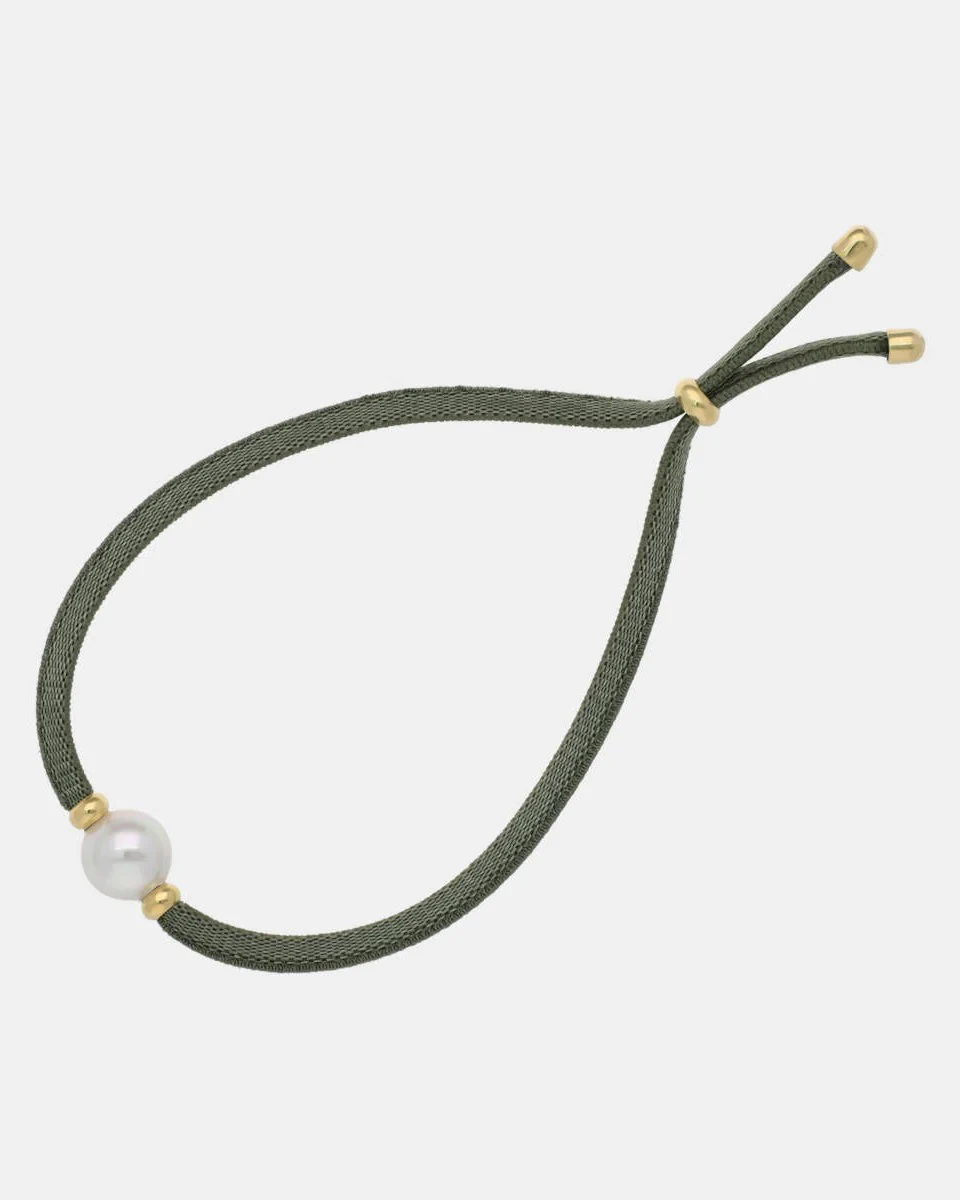 Olive green elastic bracelet with white pearl, three-quarter view on a white background.