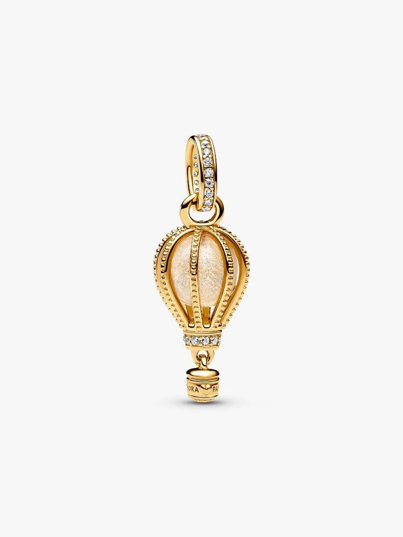 Front view of hot air balloon charm with transparent crystal and gold accents on a white background.