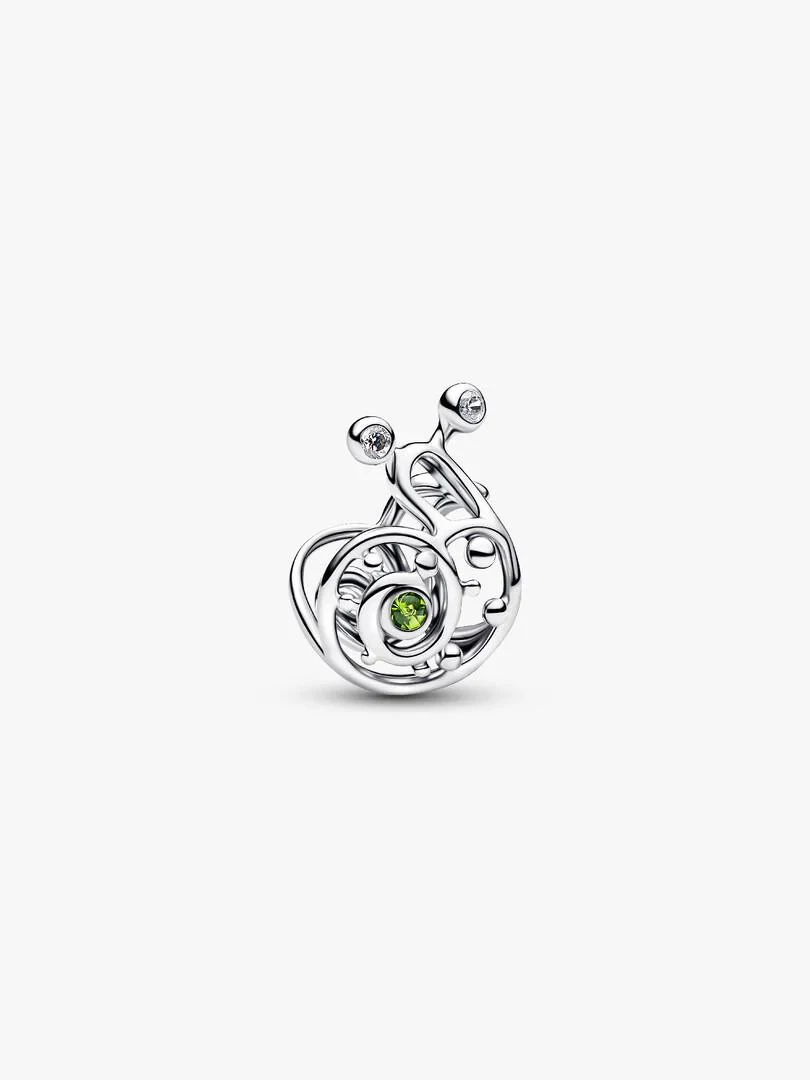 Silver snail charm with filigree details and green stone, front view on a white background.
