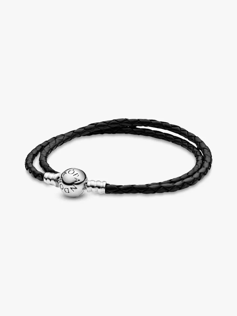 Black braided leather bracelet with engraved silver ball clasp, side view on white background.