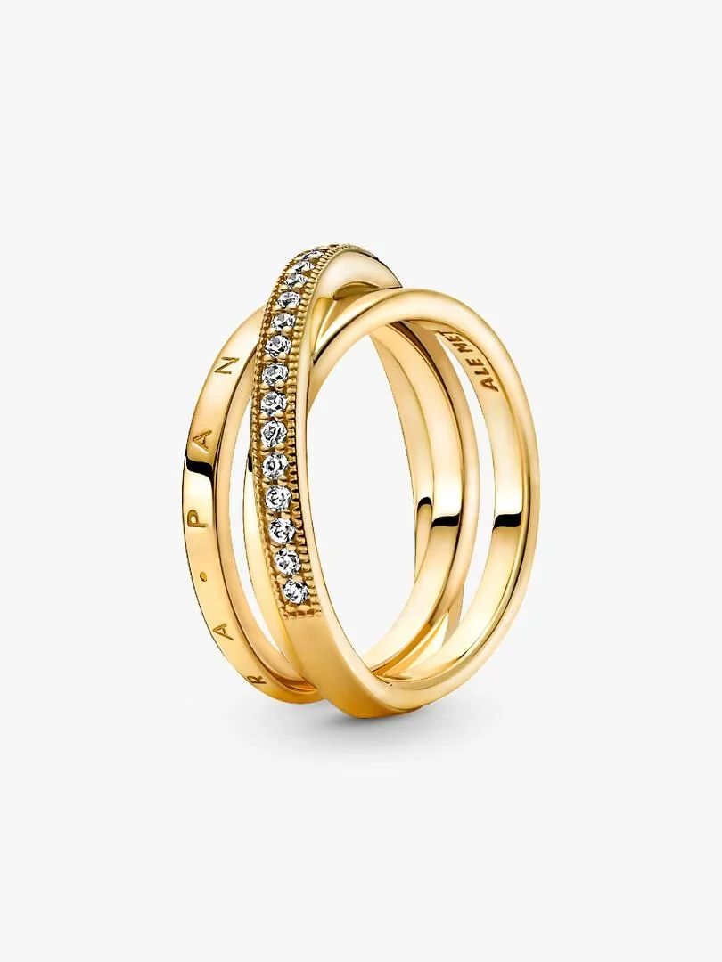 Bague triple alliance croisée en or avec pavé de zircons, vue de profil sur fond blanc.