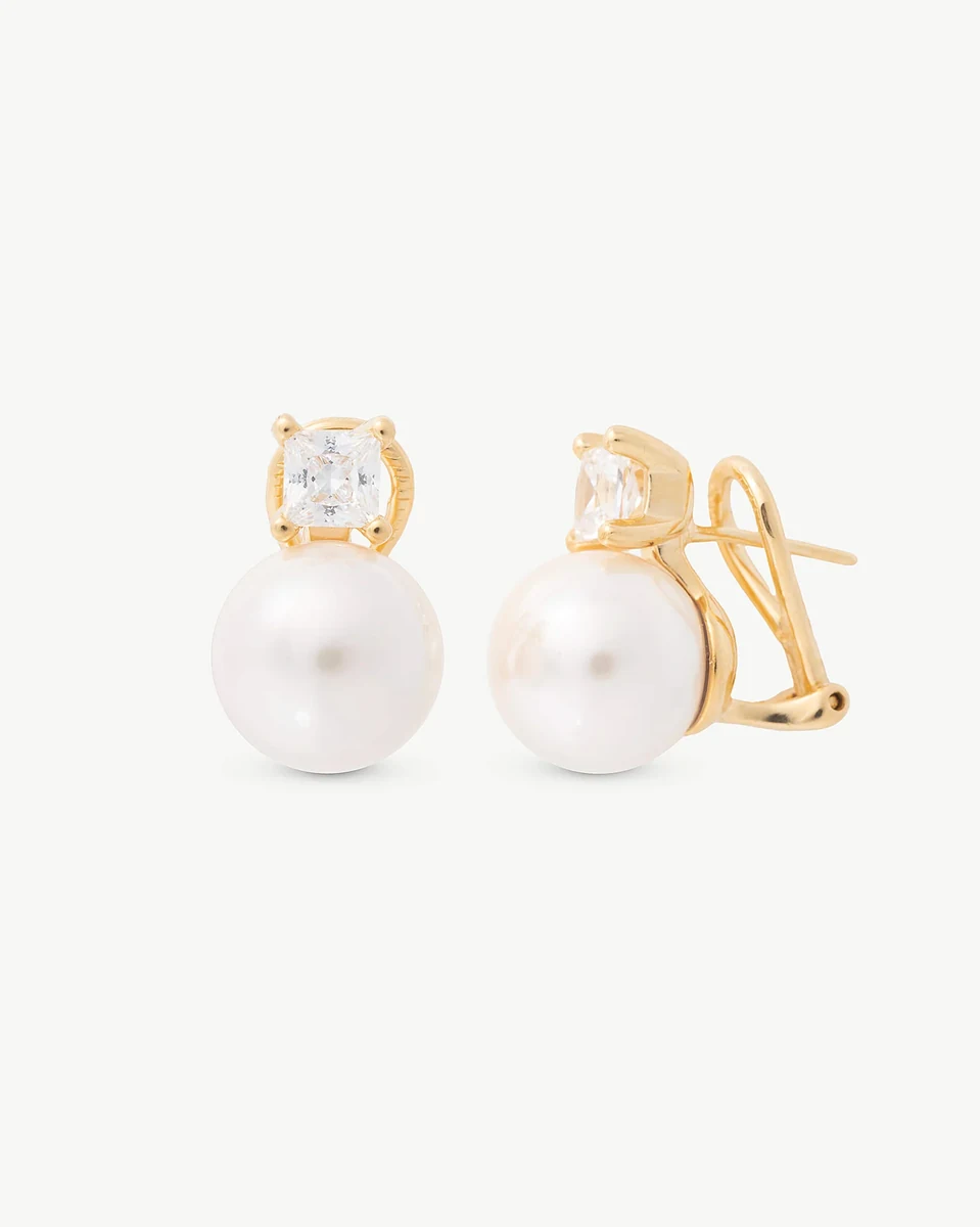Front view of pearl and cubic zirconia earrings, slightly angled shot on a white background.