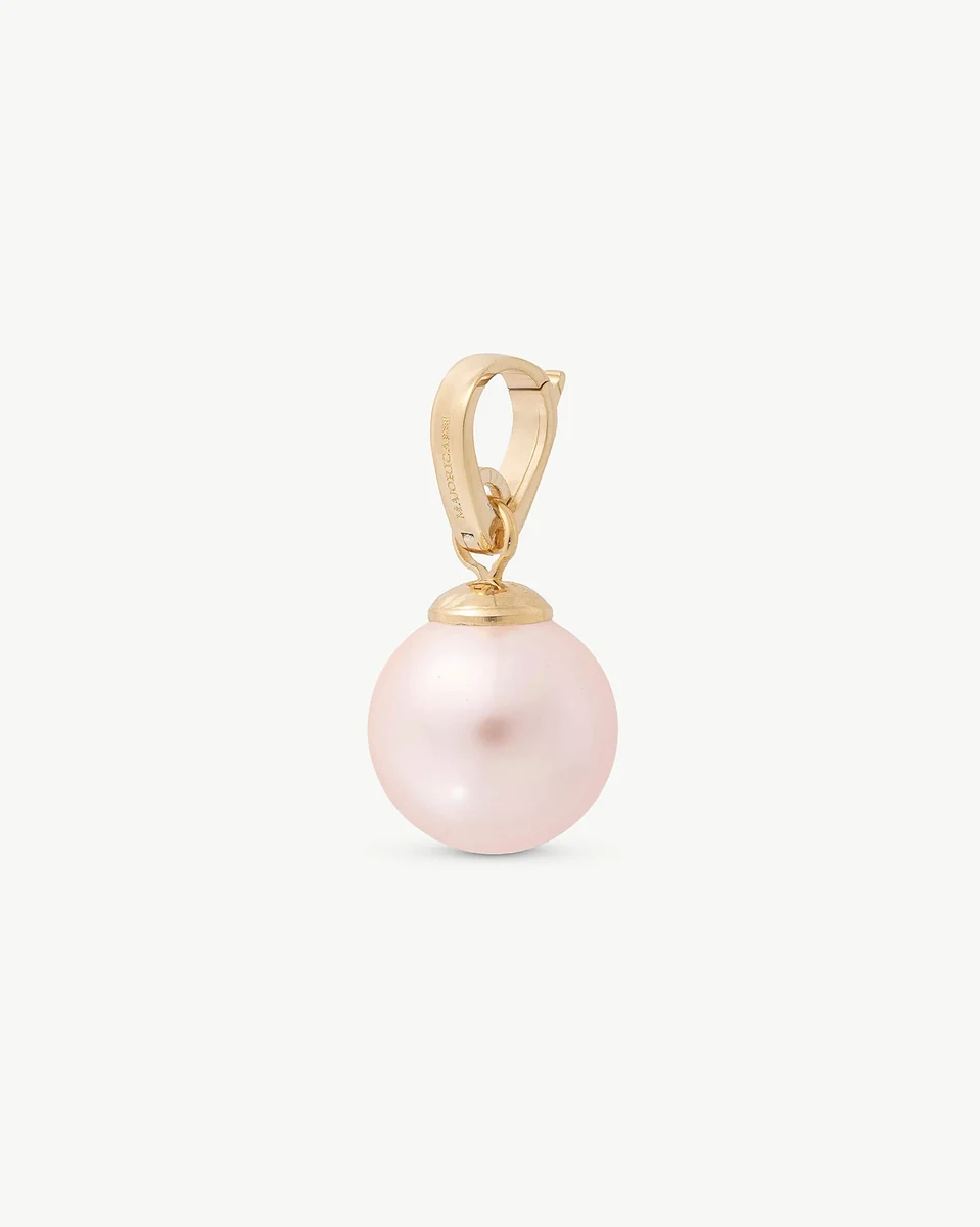 Pink pearl charm with gold setting, front view on a neutral white background.