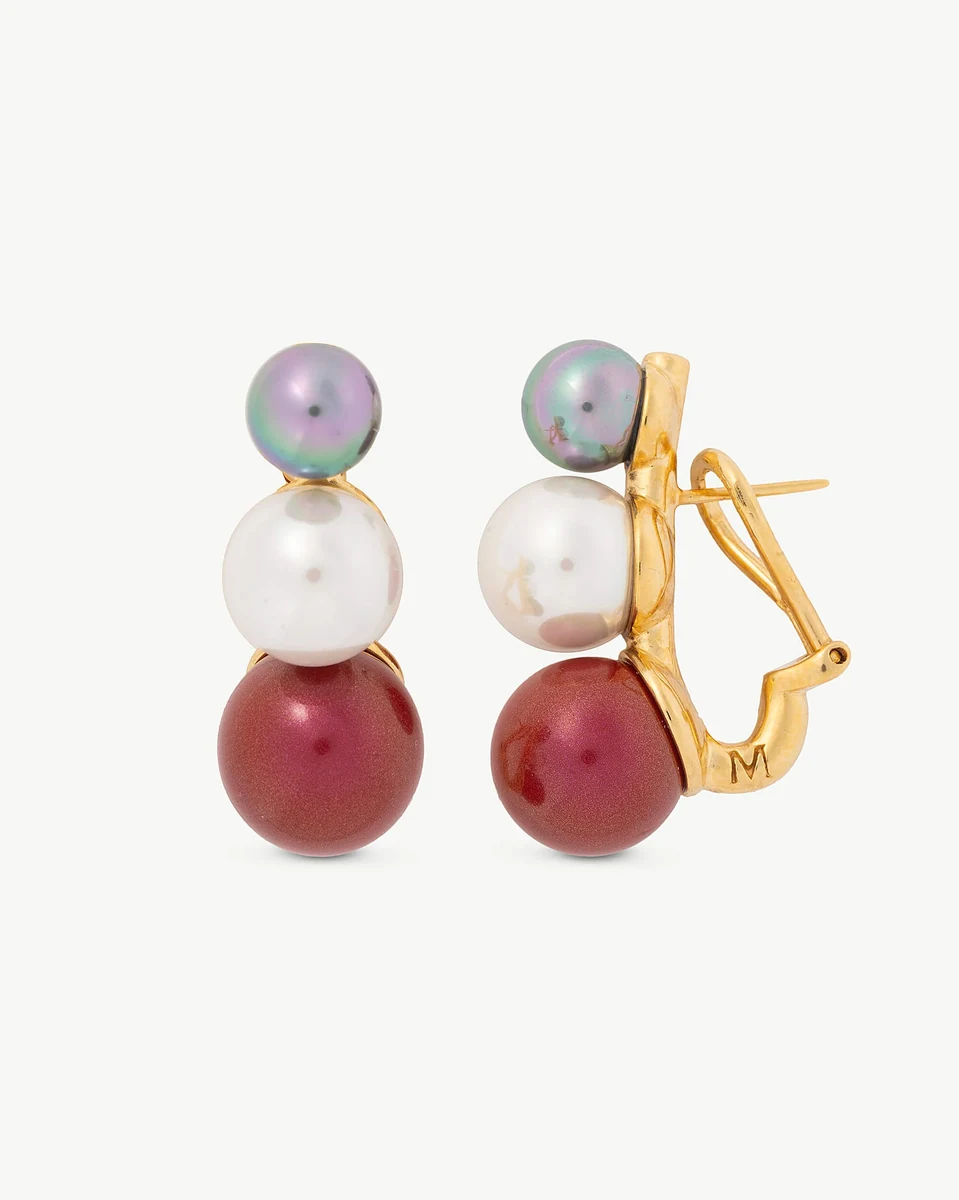 Pair of triple pearl earrings with omega clasp, front and side view on a white background.