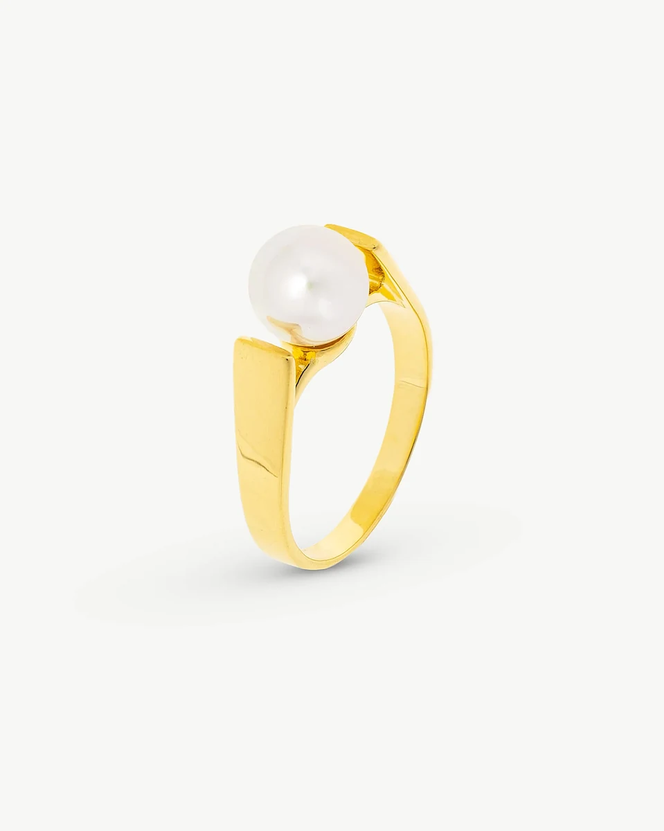 Gold-plated pearl ring shown from a side angle on a white background, highlighting the polished finish.