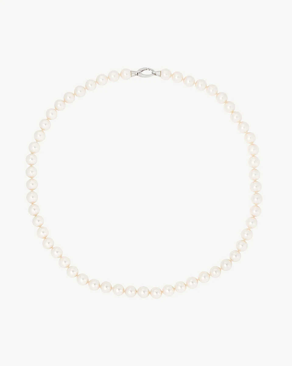 Pearl necklace arranged in a circle on a white background, full frontal view.