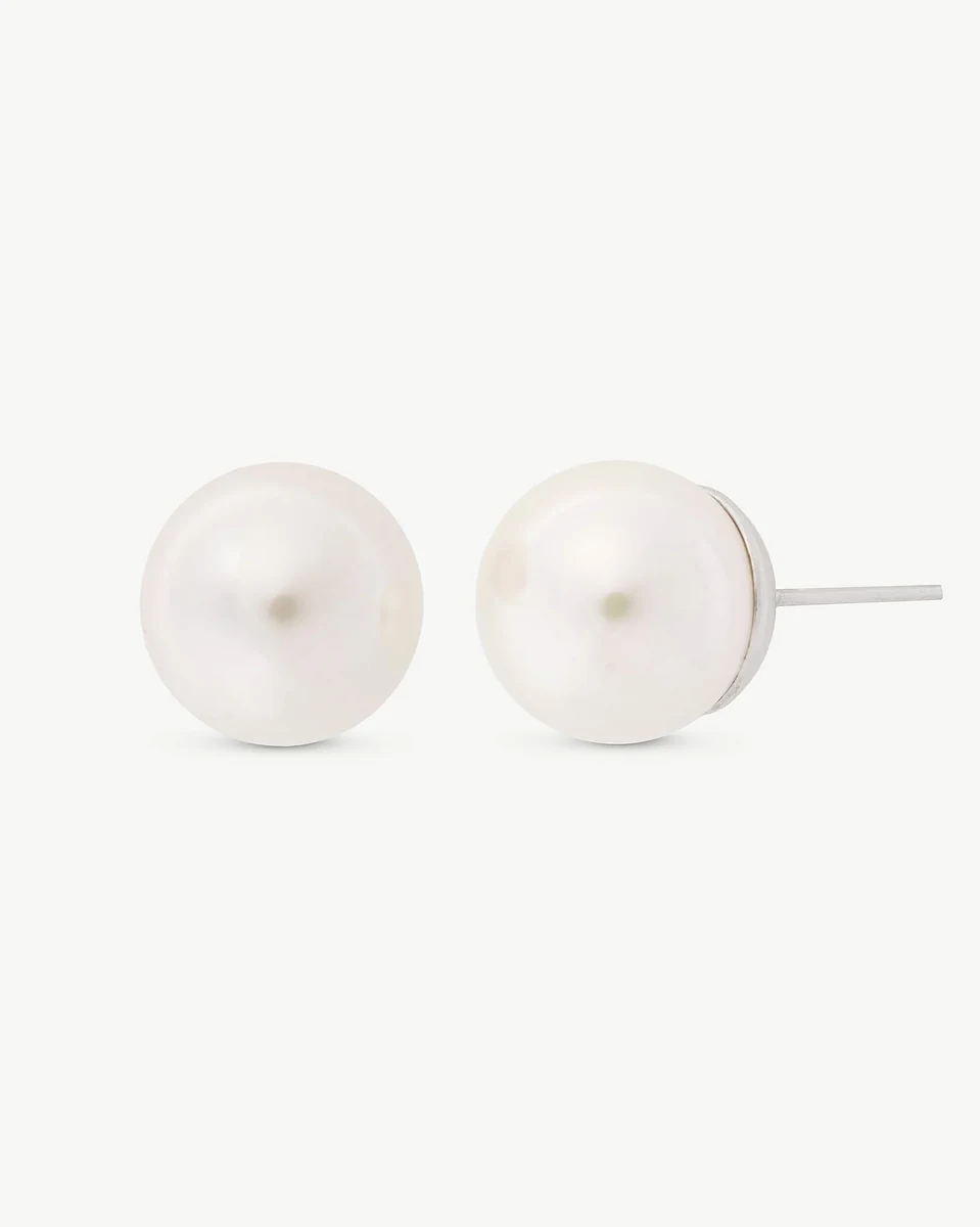 Pair of white pearl earrings shown front and profile view, on a white background.