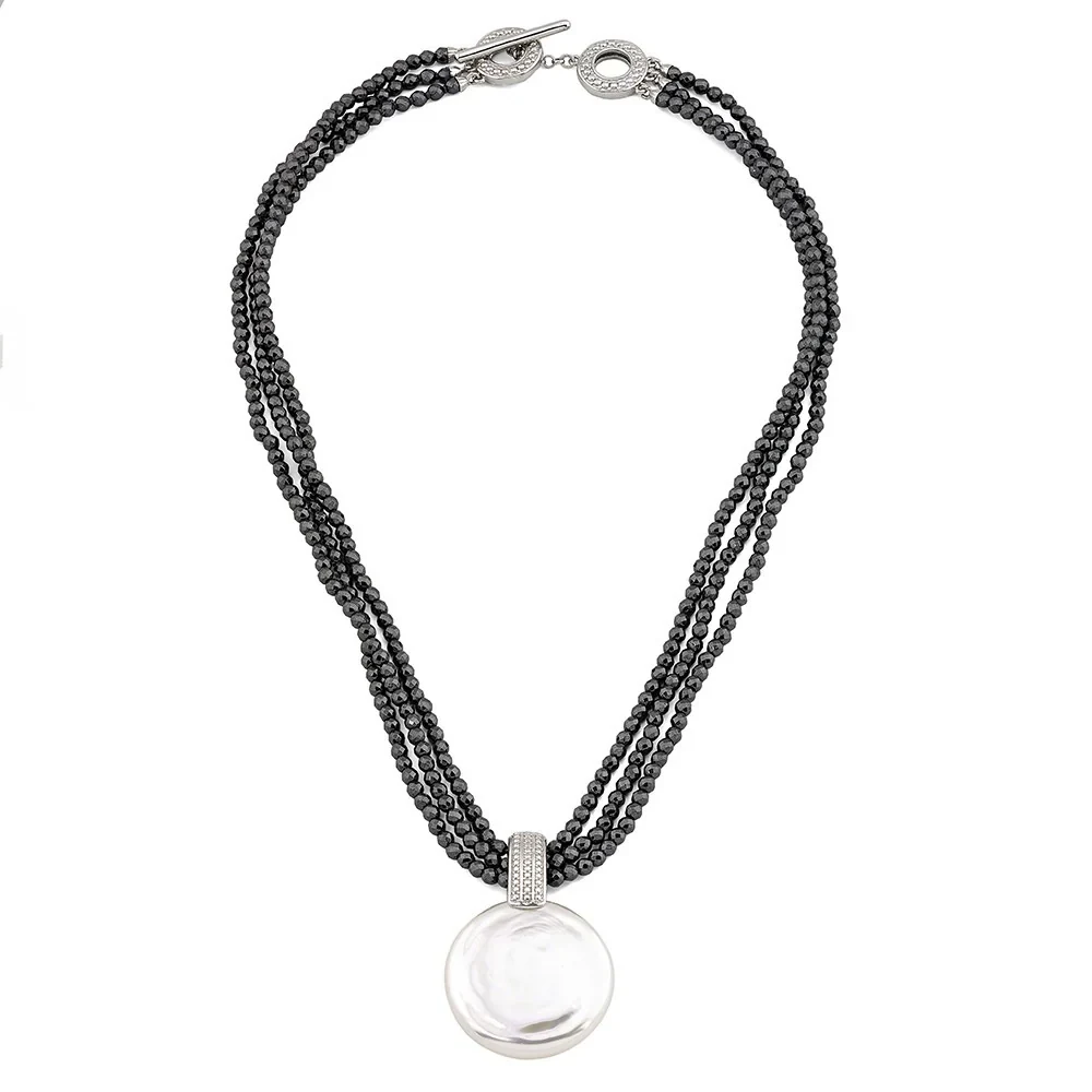 Three-strand hematite necklace with white pearl pendant, front view on a white background.