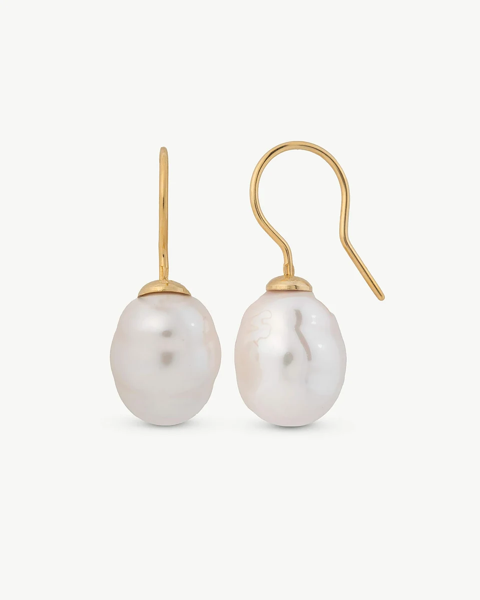 Front view of baroque pearl earrings on a white background, showing the gold hook closure detail.