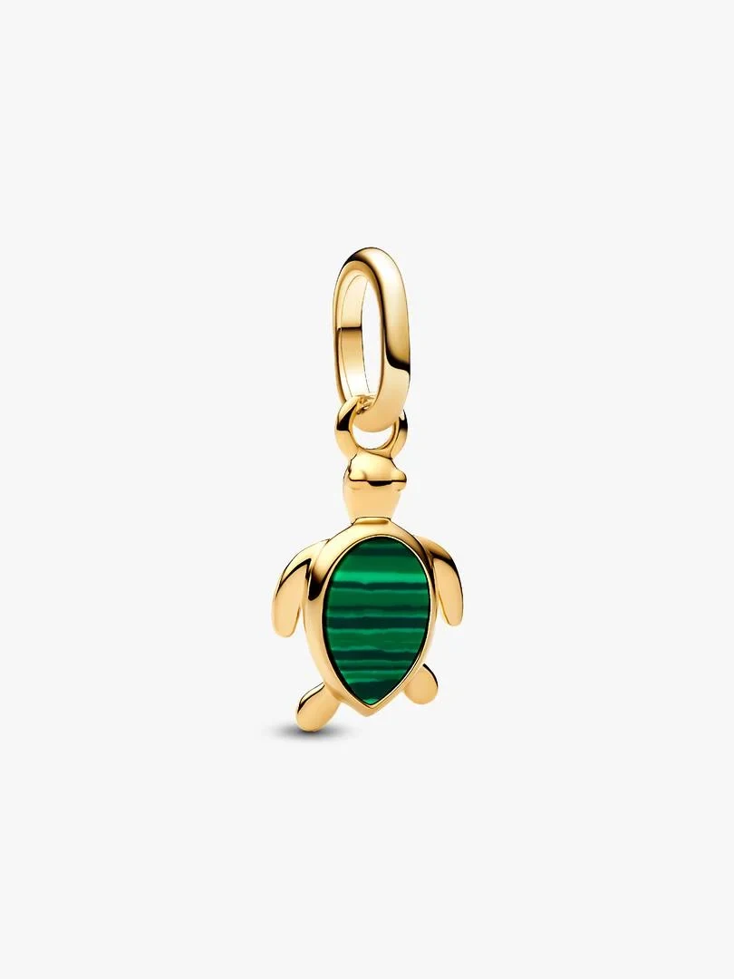 Front view of turtle charm with gold finish and green inlay, isolated on white background.